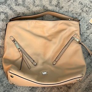 Excellent condition tan Michael Kors shoulder bag with two front zip tassels
